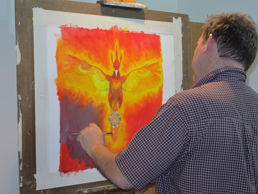 Kevin McCain working on Gift of the Phoenix cover